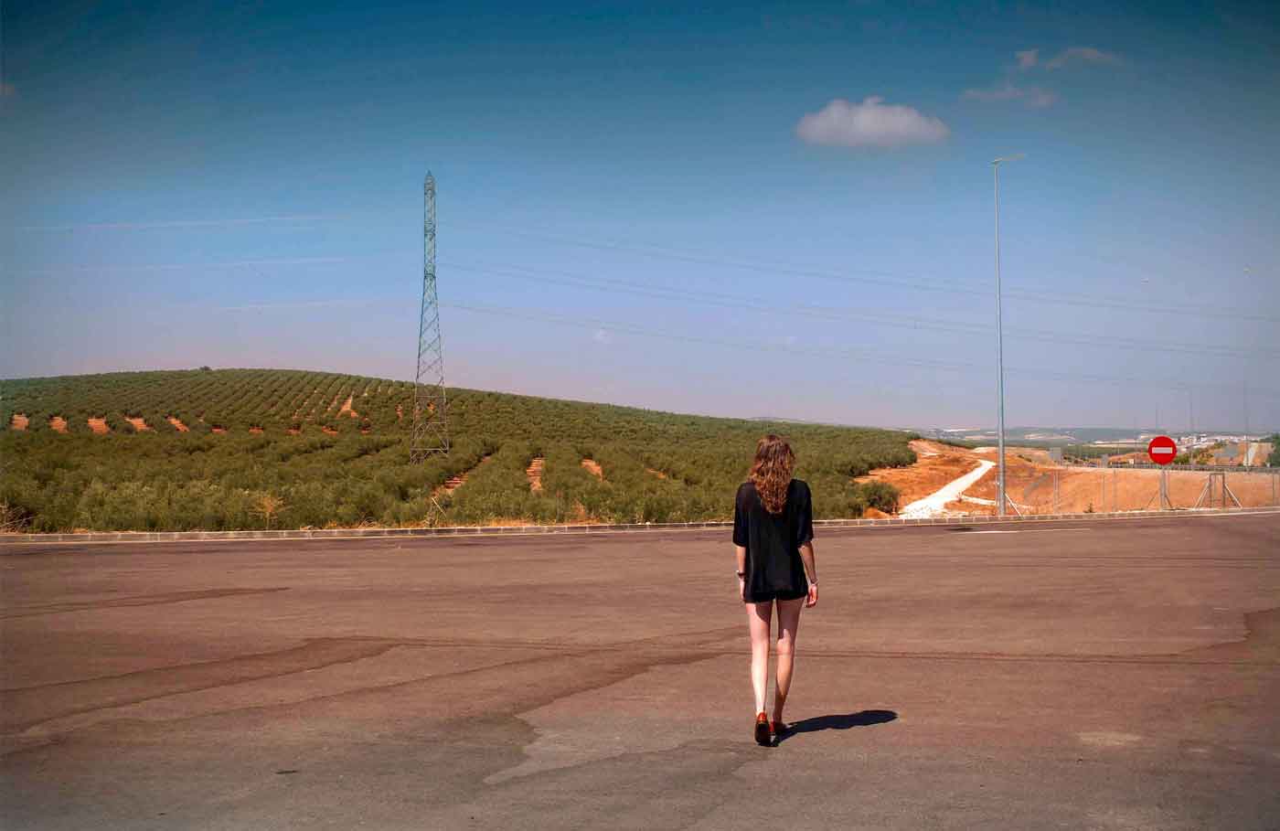 Fashion Photography: female black mini dress, deserted